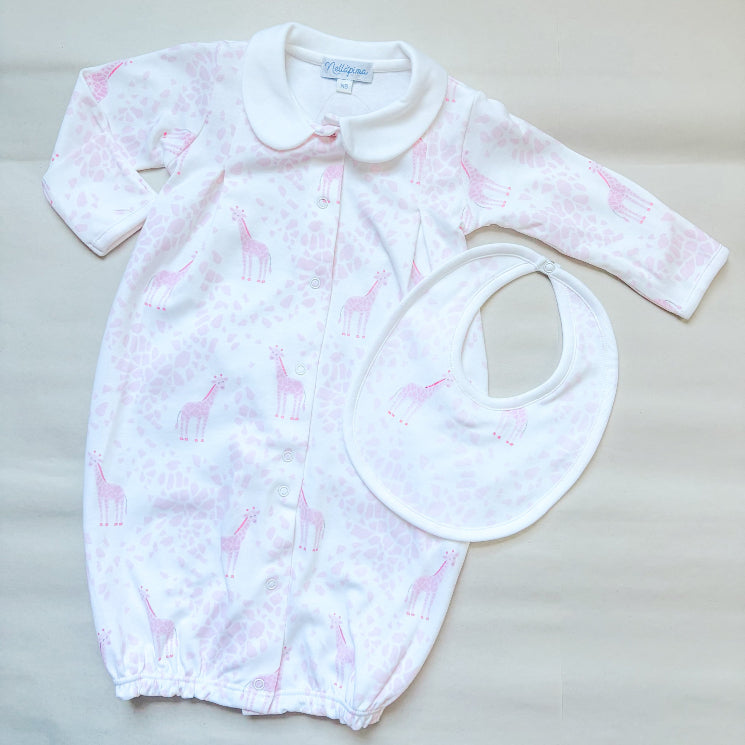 the pink giraffe gift box set with a gown and bib